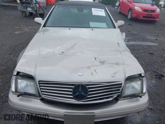 1999 Mercedes-Benz SL 500 z VIN WDBFA68F5XF172646, wystawiony jako IAAI lot #42696506 z przebiegiem 104 740 mil mil oraz . Historia ofert i sprzedaży dostępna na DreamBid. Obrazek 18.