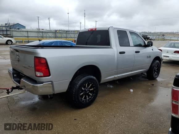 2014 Ram 1500 Tradesman with VIN 1C6RR7FG1ES204657, listed as a Copart auction lot 50946195 with 112,572 mi miles and Salvage title. Bid and sale history available at DreamBid. Image 3.