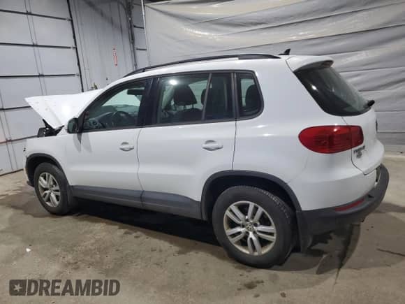 2015 Volkswagen Tiguan SEL with VIN WVGBV7AX5FW582595, listed as a Copart auction lot 68523275 with 128,991 mi miles and Salvage title. Bid and sale history available at DreamBid. Image 2.