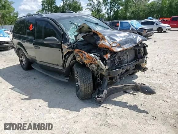 2005 Dodge Durango SXT with VIN 1D4HD38N45F612475, listed as a Copart auction lot 63110135 with 315,465 mi miles and Salvage title. Bid and sale history available at DreamBid. Image 14.