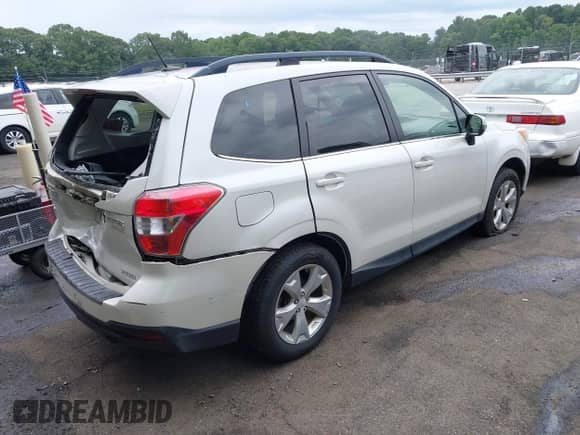 2014 Subaru Forester Touring z VIN JF2SJAPC7EH536627, wystawiony jako IAAI lot #42862912 z przebiegiem 114 727 mil mil oraz . Historia ofert i sprzedaży dostępna na DreamBid. Obrazek 4.