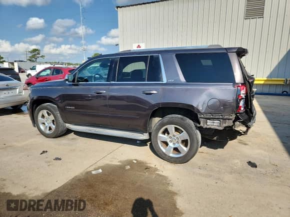 2015 Chevrolet Tahoe LTZ с VIN 1GNSCCKC2FR279732, выставлен на аукционе Copart как лот 71015645 с пробегом 106 511 миль миль и Списание • Salvage title. История ставок и продаж доступна на DreamBid. Изображение 2.