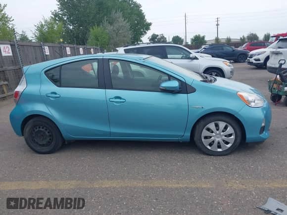 2013 Toyota Prius One z VIN JTDKDTB35D1049040, wystawiony jako IAAI lot #43130782 z przebiegiem 96 170 mil mil oraz . Historia ofert i sprzedaży dostępna na DreamBid. Obrazek 13.