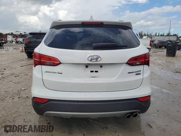 2014 Hyundai Santa Fe with VIN 5XYZU3LA9EG219817, listed as a Copart auction lot 83763975 with 116,133 mi miles and Salvage title. Bid and sale history available at DreamBid. Image 6.