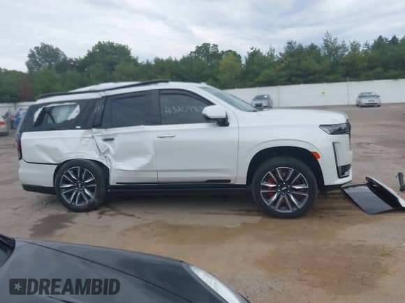 2023 Cadillac Escalade 4WD Sport Platinum with VIN 1GYS4GKL0PR421939, listed as a IAAI auction lot 43269905 with 40,874 mi miles and . Bid and sale history available at DreamBid. Image 13.