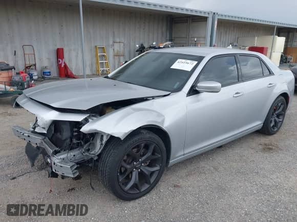 2021 Chrysler 300 S with VIN 2C3CCABG6MH520049, listed as a IAAI auction lot 42419672 with 56,303 mi miles and . Bid and sale history available at DreamBid. Image 2.