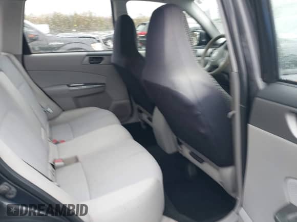 2012 Subaru Forester X z VIN JF2SHABC9CG464917, wystawiony jako IAAI lot #43517197 z przebiegiem 162 536 mil mil oraz . Historia ofert i sprzedaży dostępna na DreamBid. Obrazek 8.