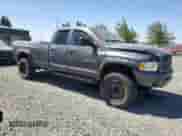 2004 Dodge 2500 SLT with VIN 3D7KU28C64G122702, listed as a Copart auction lot 68051125 with 240,757 mi miles and Salvage title. Bid and sale history available at DreamBid. Image 4.