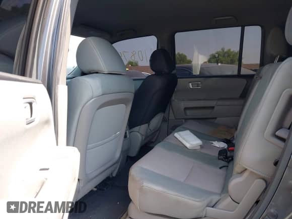 2013 Honda Pilot EX with VIN 5FNYF3H4XDB030298, listed as a IAAI auction lot 42710875 with 108,277 mi miles and . Bid and sale history available at DreamBid. Image 8.