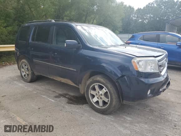 2009 Honda Pilot Touring with VIN 5FNYF48999B016322, listed as a Copart auction lot 71404925 with 205,468 mi miles and Salvage title. Bid and sale history available at DreamBid. Image 4.