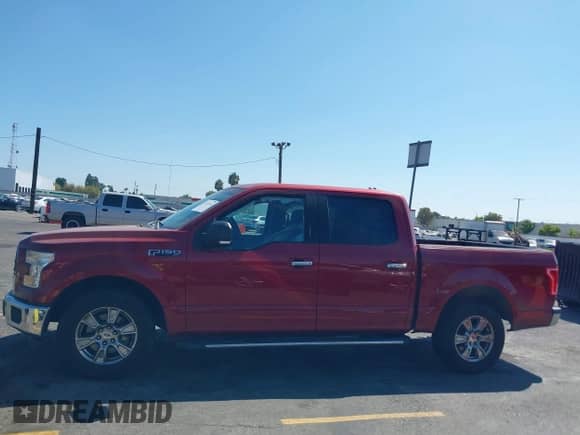 2015 Ford F-150 XL with VIN 1FTEW1CF6FKE10373, listed as a IAAI auction lot 43232162 with 248,471 mi miles and . Bid and sale history available at DreamBid. Image 14.