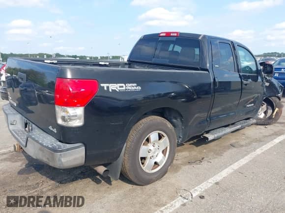 2008 Toyota Tundra with VIN 5TBBV54118S506092, listed as a IAAI auction lot 43285638 with 231,389 mi miles and . Bid and sale history available at DreamBid. Image 4.