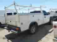 2005 Chevrolet Silverado 2500HD Work Truck with VIN 1GBHC24U45E226673, listed as a IAAI auction lot 42975891 with 254,063 mi miles and . Bid and sale history available at DreamBid. Image 4.