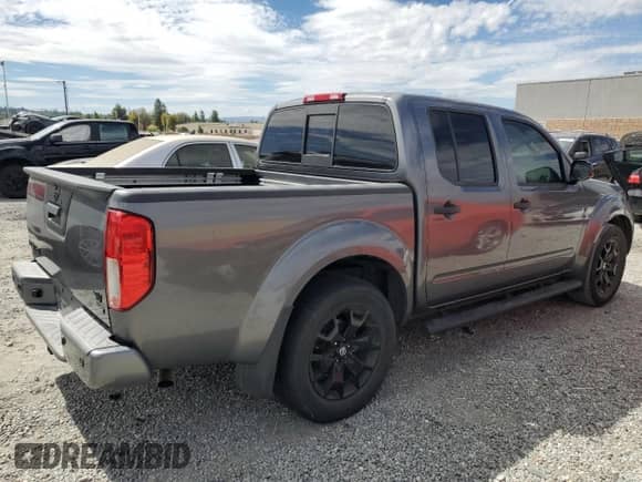 2021 Nissan Frontier SV with VIN 1N6ED0EA5MN700906, listed as a Copart auction lot 82106195 with 50,270 mi miles and Salvage title. Bid and sale history available at DreamBid. Image 3.