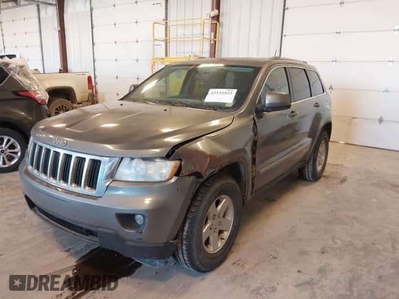 2012 Jeep Grand Cherokee Laredo с VIN 1C4RJFAG3CC214762, выставлен на аукционе IAAI как лот 43153932 с пробегом 257 360 миль миль и . История ставок и продаж доступна на DreamBid. Изображение 2.