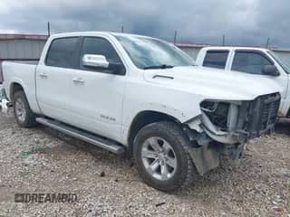 2022 Ram 1500 Laramie z VIN 1C6SRFJT0NN234411, wystawiony jako IAAI lot #42695457 z przebiegiem 94 721 mil mil oraz . Historia ofert i sprzedaży dostępna na DreamBid. Obrazek 1.