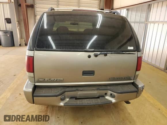 2000 Chevrolet Blazer LT с VIN 1GNDT13W6Y2352456, выставлен на аукционе Copart как лот 42962215 с пробегом 177 893 миль миль и Списание • Salvage title. История ставок и продаж доступна на DreamBid. Изображение 6.