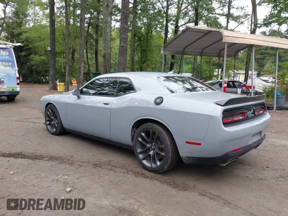 2022 Dodge Challenger R/T Scat Pack Widebody with VIN 2C3CDZFJXNH140568, listed as a IAAI auction lot 43259878 with 18,659 mi miles and . Bid and sale history available at DreamBid. Image 3.