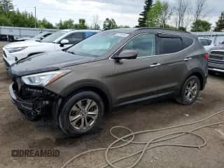 2014 Hyundai Santa Fe with VIN 5XYZU3LB5EG159334, listed as a Copart auction lot 59119255 with 196,591 mi miles and Salvage title. Bid and sale history available at DreamBid. Image 1.