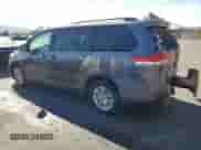 2012 Toyota Sienna XLE AAS with VIN 5TDYK3DC7CS275515, listed as a Copart auction lot 63839725 with 149,968 mi miles and Salvage title. Bid and sale history available at DreamBid. Image 2.