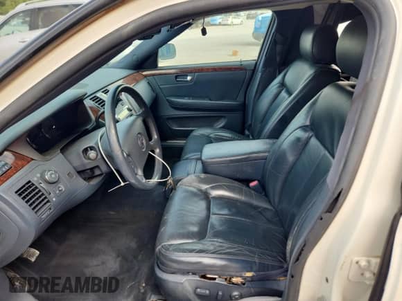 2006 Cadillac DTS Professional with VIN 1GEEH06Y36U500285, listed as a Copart auction lot 66305425 with 122,220 mi miles and Salvage title. Bid and sale history available at DreamBid. Image 7.