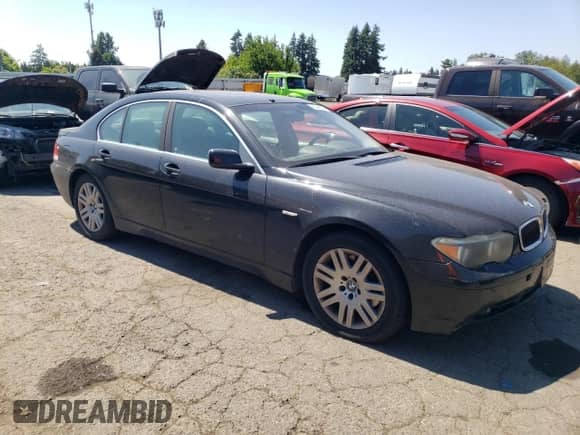 2003 BMW 7 Series 745i with VIN WBAGL63483DP61909, listed as a Copart auction lot 65448915 with 191,962 mi miles and Salvage title. Bid and sale history available at DreamBid. Image 4.