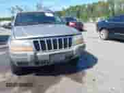 2002 Jeep Grand Cherokee Laredo with VIN 1J4GX48S32C127277, listed as a IAAI auction lot 43125887 with 139,410 mi miles and . Bid and sale history available at DreamBid. Image 6.