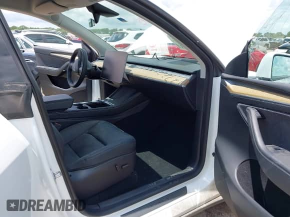2023 Tesla Model Y Long Range с VIN 7SAYGDEE2PA032311, выставлен на аукционе IAAI как лот 42720695 с пробегом 20 640 миль миль и . История ставок и продаж доступна на DreamBid. Изображение 5.
