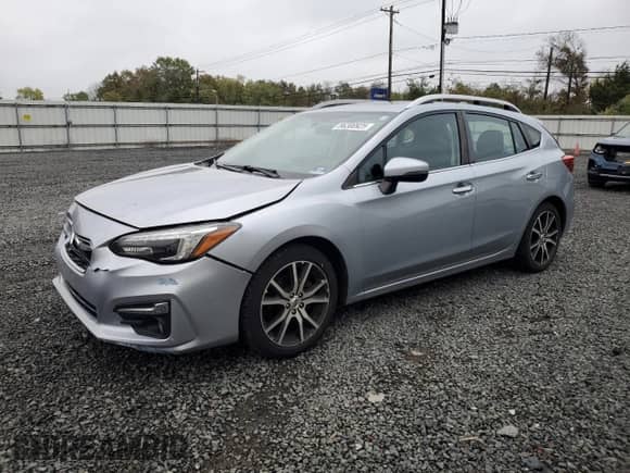 2018 Subaru Impreza Limited with VIN 4S3GTAT60J3702976, listed as a Copart auction lot 86300925 with 169,246 mi miles and Salvage title. Bid and sale history available at DreamBid. Image 1.