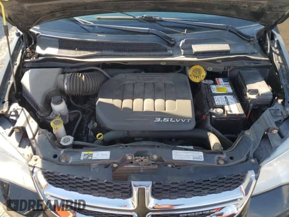 2014 Dodge Grand Caravan SXT with VIN 2C4RDGBG4ER105961, listed as a Copart auction lot 49866065 with 96,575 mi miles and Clean title. Bid and sale history available at DreamBid. Image 13.