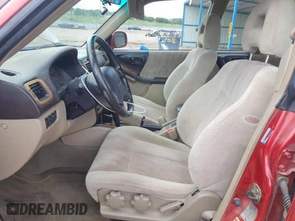 2002 Subaru Forester S with VIN JF1SF65662H702762, listed as a Copart auction lot 62775485 with 161,698 mi miles and Salvage title. Bid and sale history available at DreamBid. Image 7.