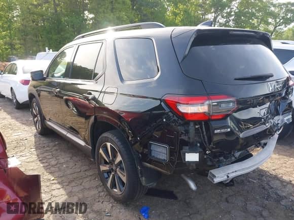 2023 Honda Pilot Touring с VIN 5FNYG2H77PB002996, выставлен на аукционе IAAI как лот 42070607 с пробегом 31 875 миль миль и . История ставок и продаж доступна на DreamBid. Изображение 3.