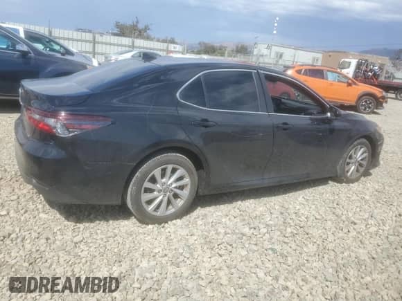 2023 Toyota Camry LE z VIN 4T1C11AK2PU156068, wystawiony jako Copart lot #81776895 z przebiegiem 28 144 mil mil oraz Szkoda całkowita • Salvage title. Historia ofert i sprzedaży dostępna na DreamBid. Obrazek 3.