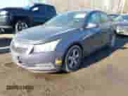 2013 Chevrolet Cruze 1LT with VIN 1G1PD5SB1D7328161, listed as a IAAI auction lot 41360894 with 189,868 mi miles and . Bid and sale history available at DreamBid. Image 2.