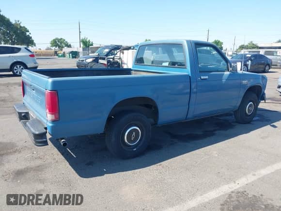 1989 Chevrolet S-10 z VIN 1GCBS14E3K8220865, wystawiony jako IAAI lot #42461457 z przebiegiem 203 800 mil mil oraz . Historia ofert i sprzedaży dostępna na DreamBid. Obrazek 4.