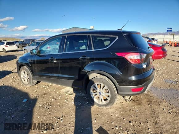 2017 Ford Escape SE с VIN 1FMCU9G99HUC81614, выставлен на аукционе Copart как лот 90099755 с пробегом 108 193 миль миль и Чистый • Clean title. История ставок и продаж доступна на DreamBid. Изображение 2.