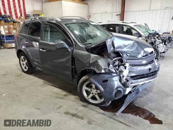 2013 Chevrolet Captiva Sport LT with VIN 3GNAL3EK0DS549162, listed as a Copart auction lot 62727224 with 104,717 mi miles and Salvage title. Bid and sale history available at DreamBid. Image 4.
