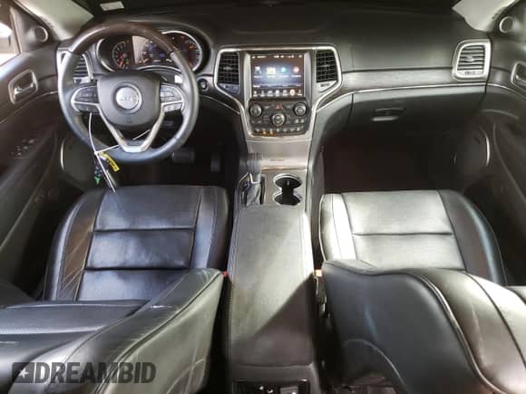 2017 Jeep Grand Cherokee Summit with VIN 1C4RJFJG7HC649954, listed as a Copart auction lot 71033995 with 88,078 mi miles and Salvage title. Bid and sale history available at DreamBid. Image 8.