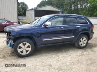 2012 Jeep Grand Cherokee Limited z VIN 1C4RJFBT2CC274320, wystawiony jako Copart lot #59861565 z przebiegiem 141 626 mil mil oraz Szkoda całkowita • Salvage title. Historia ofert i sprzedaży dostępna na DreamBid. Obrazek 1.