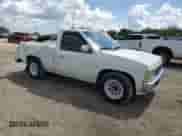1993 Nissan Frontier с VIN 1N6SD11SXPC404318, выставлен на аукционе Copart как лот 67115335 с пробегом 140 551 миль миль и Списание • Salvage title. История ставок и продаж доступна на DreamBid. Изображение 4.