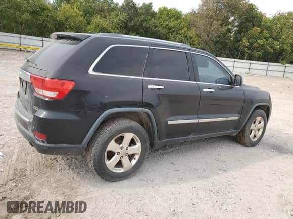 2013 Jeep Grand Cherokee Limited z VIN 1C4RJEBG4DC636503, wystawiony jako Copart lot #89665075 z przebiegiem 143 877 mil mil oraz Czysty tytuł • Clean title. Historia ofert i sprzedaży dostępna na DreamBid. Obrazek 3.