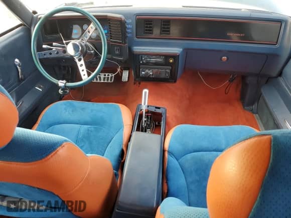 1984 Chevrolet Monte Carlo с VIN 1G1AZ37GXER137103, выставлен на аукционе Copart как лот 74534514 с пробегом Не указан миль и Чистый • Clean title. История ставок и продаж доступна на DreamBid. Изображение 8.