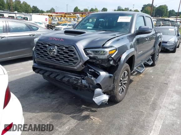 2023 Toyota Tacoma SR z VIN 3TMCZ5AN3PM613358, wystawiony jako IAAI lot #43211852 z przebiegiem 25 287 mil mil oraz . Historia ofert i sprzedaży dostępna na DreamBid. Obrazek 22.