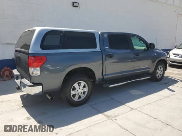 2007 Toyota Tundra SR5 z VIN 5TBET541X7S454852, wystawiony jako Copart lot #61135375 z przebiegiem Nie podano mil oraz Szkoda całkowita • Salvage title. Historia ofert i sprzedaży dostępna na DreamBid. Obrazek 3.