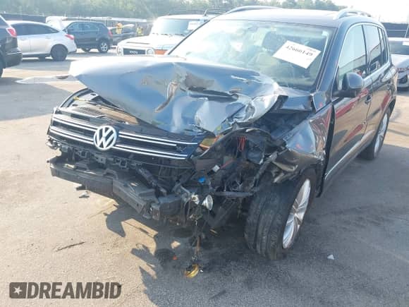 2016 Volkswagen Tiguan S z VIN WVGAV7AX0GW563336, wystawiony jako IAAI lot #42666149 z przebiegiem 181 587 mil mil oraz . Historia ofert i sprzedaży dostępna na DreamBid. Obrazek 6.