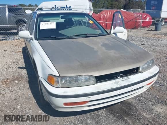 1992 Honda Accord LX z VIN JHMCB7659NC048944, wystawiony jako IAAI lot #41704471 z przebiegiem 253 535 mil mil oraz . Historia ofert i sprzedaży dostępna na DreamBid. Obrazek 6.