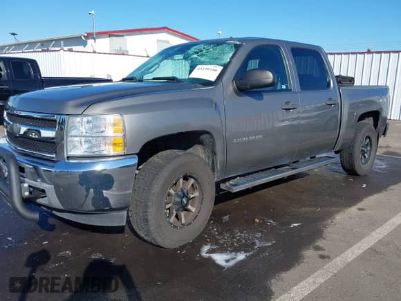 2013 Chevrolet Silverado 1500 LT with VIN 3GCPKSE76DG110112, listed as a IAAI auction lot 43230340 with 179,692 mi miles and . Bid and sale history available at DreamBid. Image 2.