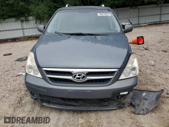2007 Hyundai Entourage GLS with VIN KNDMC233376023404, listed as a Copart auction lot 69413625 with 135,989 mi miles and Salvage title. Bid and sale history available at DreamBid. Image 5.
