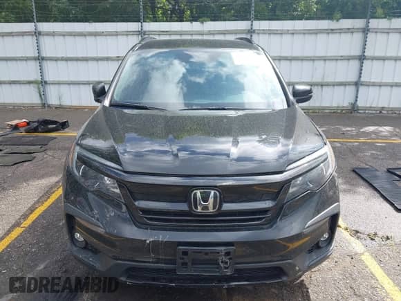 2022 Honda Pilot Sport with VIN 5FNYF6H3XNB102854, listed as a IAAI auction lot 43096219 with 33,735 mi miles and . Bid and sale history available at DreamBid. Image 12.