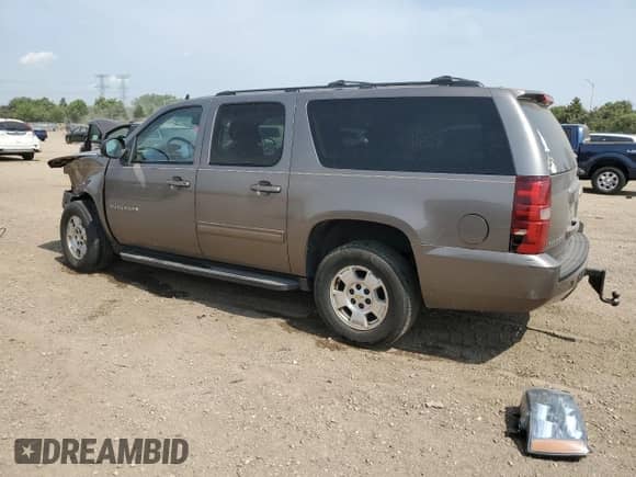 2012 Chevrolet Suburban LS with VIN 1GNSCHE00CR178893, listed as a Copart auction lot 58596515 with 136,685 mi miles and Salvage title. Bid and sale history available at DreamBid. Image 2.